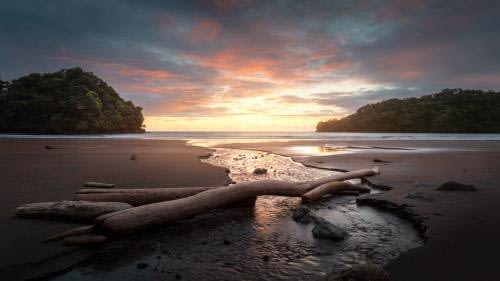 Wonderful sunset on a paradise beach, the MorroMico beach, close to Nuqui, in the Chocó region of Colombia Wonderful sunset on a paradise beach, the MorroMico beach, close to Nuqui, in the Chocó region of Colombia