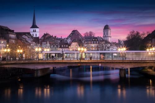 The Royal Bridge in Strasbourg during a colorful winter evening The Royal Bridge in Strasbourg during a colorful winter evening