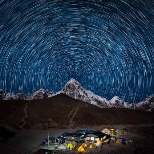 Star trail aligned with Pumori Peak, at Gorak Shep, last settlement before Everest Base Camp Star trail aligned with Pumori Peak, at Gorak Shep, last settlement before Everest Base Camp