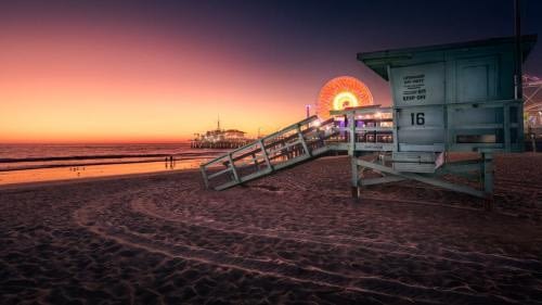 Beautiful sunset on Santa Monica beach when tourists and lifeguards are gone Beautiful sunset on Santa Monica beach when tourists and lifeguards are gone